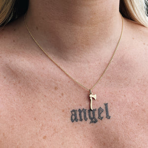 Gold hatchet charm necklace, gold necklace, hatchet necklace, necklace on person, hellhound jewelry necklace, charm necklace