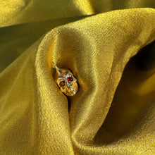 10k Gold Baby Skull Charm with Garnet Eyes