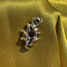 Abstract Nebula Charm with Garnet