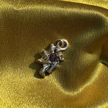 Abstract Nebula Charm with Garnet
