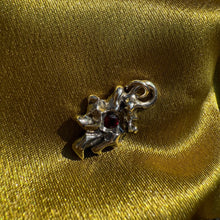 Abstract Nebula Charm with Garnet