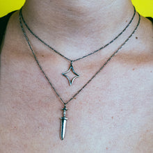 nebula necklace layered with ritual dagger necklace, hellhound jewelry necklace, sterling silver necklace, star necklace, charm necklace